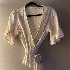 Wrap around blouse with ruffled sleeve